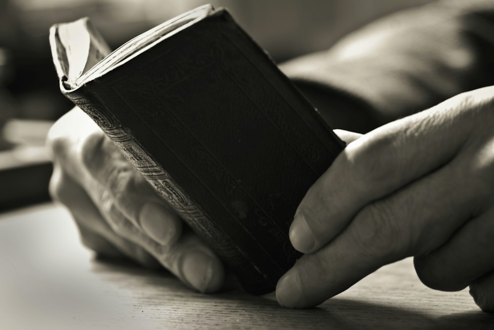Bible held for study and reflection